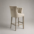 Sgabello da bar imbottito beige con schienale alto e struttura in legno 50 x 55 x 110 cm