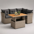 Set divano da giardino angolare 6 posti in rattan sintetico intrecciato con cuscini grigio scuro e tavolo effetto legno 260 x 200 x 70 cm